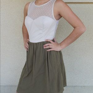 Tan and green dress with a button up back